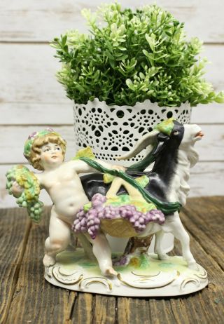 Scheibe Alsbach Porcelain Figure Of Putti Cherub And Goat With Grape Harvest