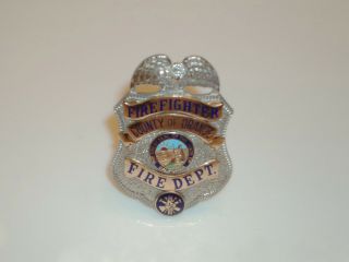 Vintage Obsolete Orange County California Fire Department Badge 1980