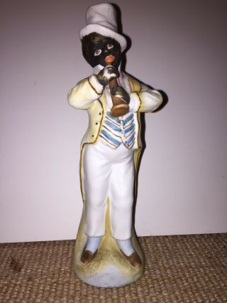 Vintage Black Americana Bisque Figure Of A Black Man Playing A Clarinet. 2