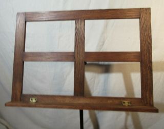 Antique oak music stand with cast iron feet 3