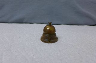 Vintage Brass Windup Figural Tape Measure Butlers Desk Bell