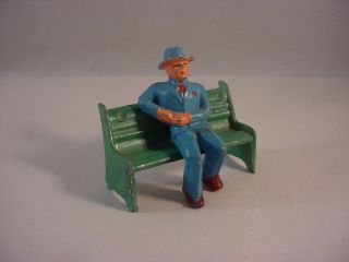 Barclay Manoil Metal Man Sitting On A Bench Toy Figure