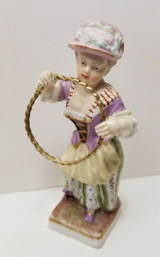 19th Century Meissen Figurine Of A Young Lady Holding A Gilded Metal Hoop