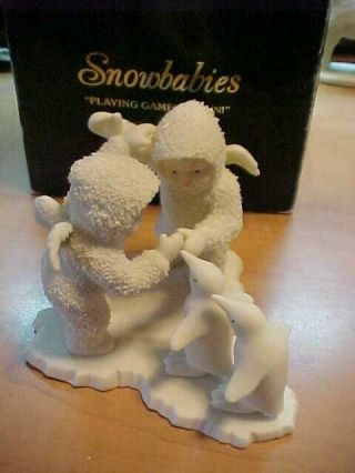 Dept.  56 Snowbabie Figurine " Playing Games Is Fun " 7947 - 2,