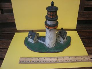 Authentic Vintage Highland Light Cast Iron Doorstop Light House Cape Cod