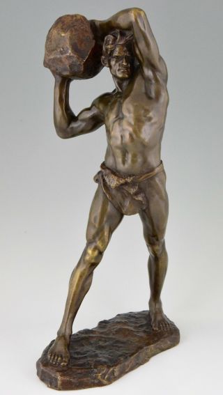 Antique bronze sculpture strong man with stone Stanislaw Czarnowski Poland 1908 2