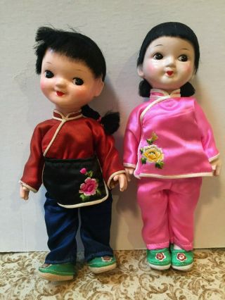 Vintage Chinese Asian Composition Doll Boy & Plastic Girl Silk Outfits Euc