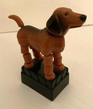 Vintage Push Puppet Toy Dog Plastic Brown Black Retriever 3 1/2 " H