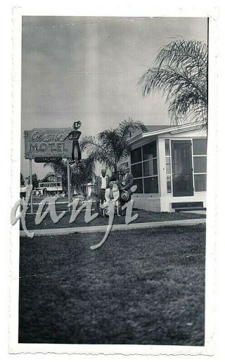 Old Tourists By Alamo Motel Neon Sign With Picture Of Black Bellhop Old Photo