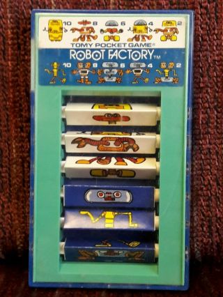 Vintage Tomy Pocket Game 7029 Robot Factory Handheld Mechanical Toy