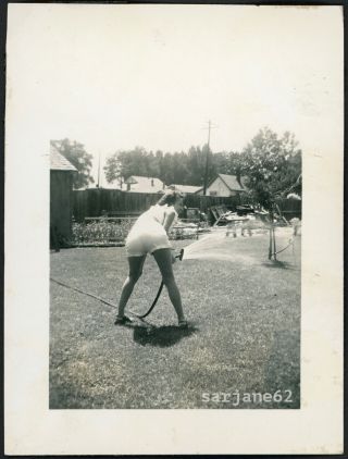Rear View Woman W/ Back To Camera Sprays Water Hose Vintage Snapshot Photo