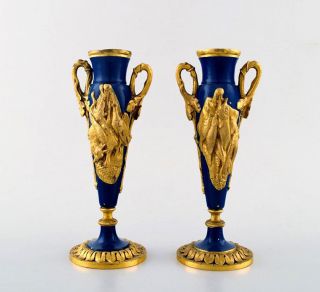 A French Gilded Bronze Vases With Game In Relief.  Late 1800s.