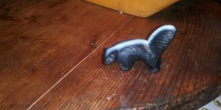 Vintage Miniature Cast Iron Skunk Figurine - Paint