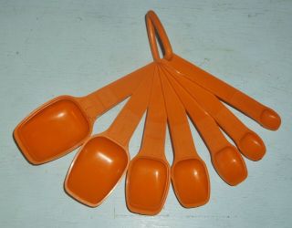 Vintage Tupperware 7 Piece Measuring Spoon Set W/ Ring Burnt Orange