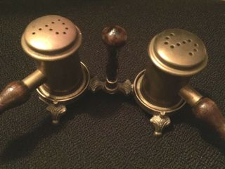 Vintage brass salt and pepper shakers with wooden handles brass on brass stand 3