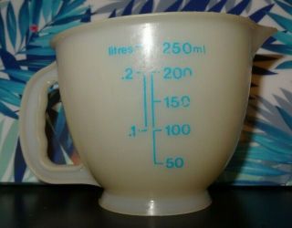 Vintage Tupperware Toys Measuring Cup 1402 - 4 1 Cup Blue Yellow Plastic Pour