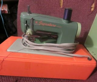 Vintage Signature Toy Sewing Machine In Case