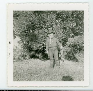 Boy In Western Cowboy Outfit With Rope Lasso.  Vintage Snapshot Found Photo