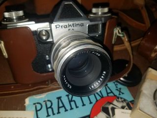 Vintage 35 Mm Praktina Fx Camera And Case And Lens Papers Light