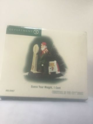 Dept.  56 Christmas In The City 56.  59467 Guess Your Weight 1 Cent Santa W/box