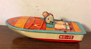 Vintage Ko Tin Toy Wind Up Boy In Boat 8” Japan