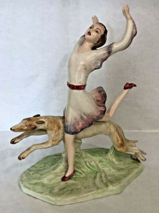 An Art Deco Goldscheider Myott China Figurine Woman Running With Hound