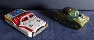2 Vintage Tin Toy Vehicles Convertible Police Car & Tank M.  T.  108