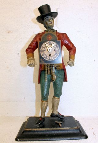 Old Table Clock,  Dutch Clock In Metal The Man Of The Hour