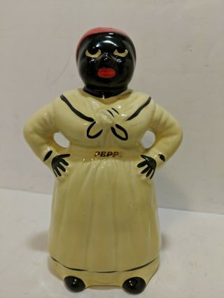 Vintage Black Americana Salty and Peppy Yellow Salt Pepper Shakers7.  5 inches, 2