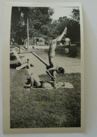 Vtg Shirtless Men Swim Trunks One Holds Other Handstand BW Snapshot Photo 1950s 2