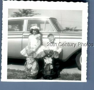 Found B&w Photo L_5859 Boy And Girl In Dress On Side Of Old Car,  Baskets