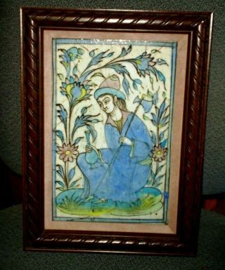 Antique Handpainted Framed Tile Persian Figure In Garden With Blade And Vase