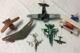 Assorment Of Old Toy Airplanes And Parts