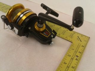 Vintage Penn 850SS Skirted Spool Spinning Reel High Speed 4.  6:1 Black and Gold 3