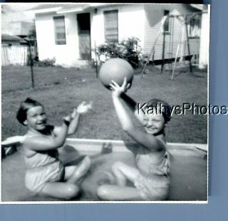 Black & White Photo B,  3004 Girls Sitting In Wading Pool Holding Ball