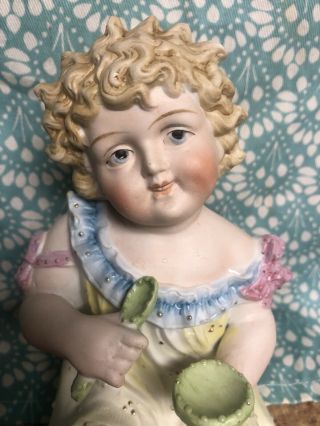Antique Conta Boehme German Bisque Figurine Piano Baby Girl With Spoon & Bowl