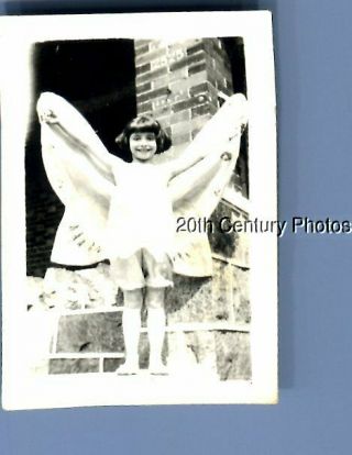 Found B&w Photo K,  6257 Little Girl In Costume With Hands Up Smiling