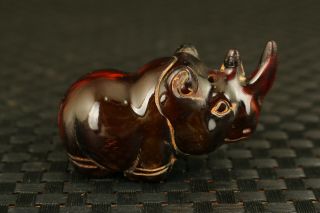 Chinese Old Yak Horn Hand Carving Rhinoceros Statue Netsuke Figure Hand Piece