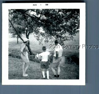 Black & White Photo A_2211 Man,  Woman And Boy From Behind By Tree,  Creek