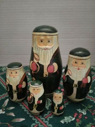 Pre - Owned Vintage Wooden Nesting Santa Claus Dolls Set Of 5 Green