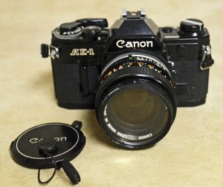 Vintage Canon Ae - 1 Slr 35mm Camera With 50mm Lens In