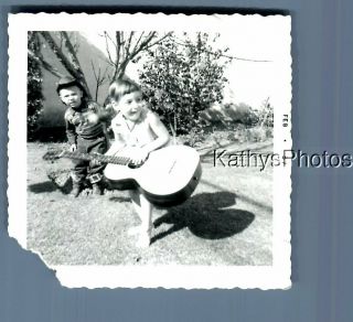 Black & White Photo B,  2890 Girl Holding Guitar By Little Cowboy Behind