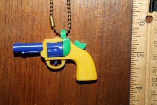Vintage Miniature Plastic Yellow And Blue Green Star Pistol Key Chain