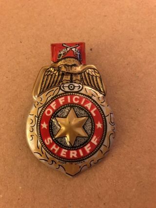 Official Sheriff.  Dime Store Tin Toy Clicker