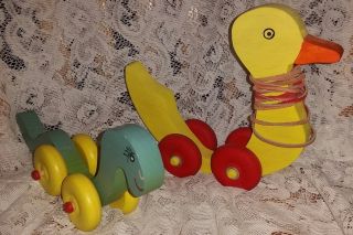 Vintage Wooden Duck Pull Toy W/leather & Red Wheels & Dinosaur W/ Yellow Wheels