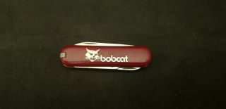 Victorinox Classic Sd Swiss Army Knife / Bobcat Advertising Ad / Red