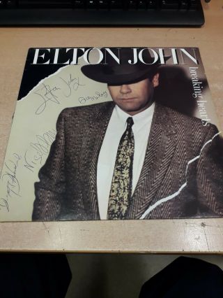 Elton John.  Hand Signed Vinyl Album.  Breaking Hearts.  Signed By 4 Band Members