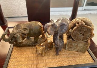 A Group Of Four Chinese Carved Soapstone Statues.