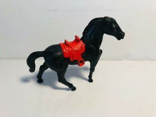 Stuart Black Standing Horse With Red Saddle.