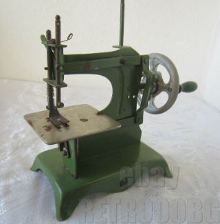 RARE ANTIQUE VINTAGE SMALL CHILD TOY SEWING MACHINE,  green. 2